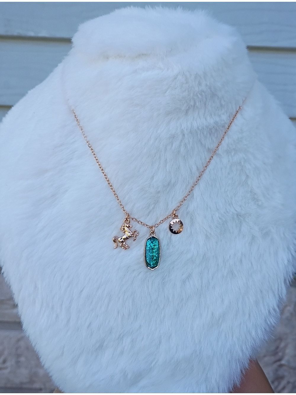 2/$10 December Girl Gold-Tone Necklace with Teal Glitter Pendant and Horse Charm - Picture 3 of 8